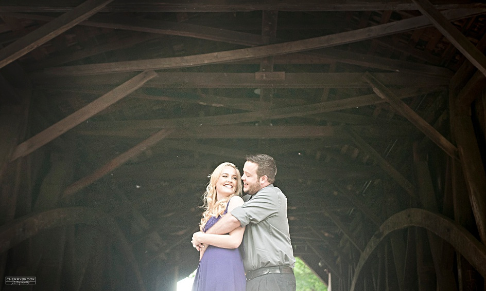 Engagement Photographs of two smiling individuals. 