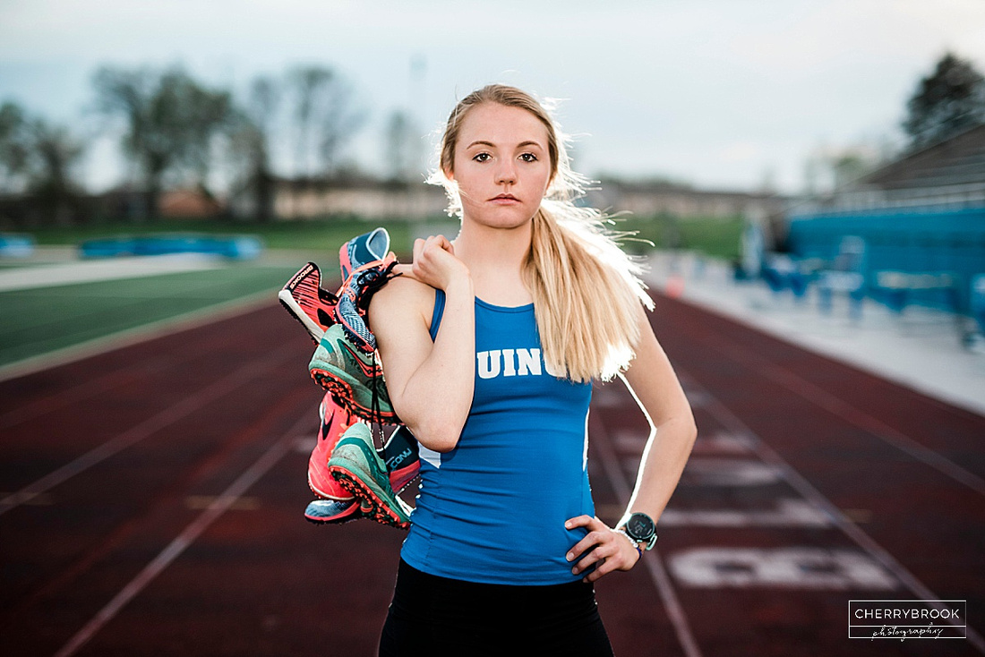Senior Portrait Session Featuring a Track and Field Theme 