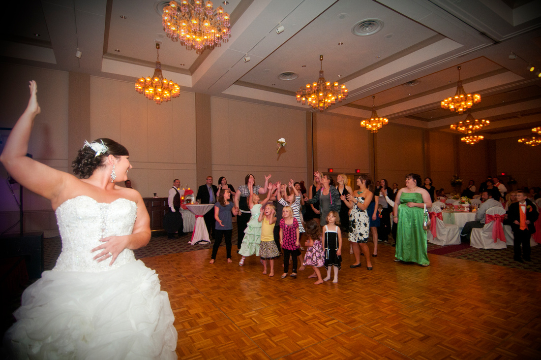 Bride throwing Boquete at Abraham Lincoln Hotel and Conference Center 